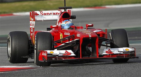 Ferrari's Formula One driver Fernando Alonso of Spain takes a curve during a training session at the Circuit de Catalunya racetrack in Montm Ferrari's Formula One driver Fernando Alonso of Spain takes a curve during a training session at the Circuit de Catalunya racetrack in Montm