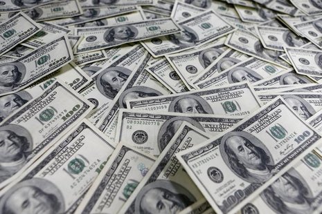 One hundred dollar notes are seen in this photo illustration. REUTERS/Lee Jae-Won One hundred dollar notes are seen in this photo illustration. REUTERS/Lee Jae-Won