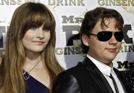 Paris and her brother Prince, children of the late Michael Jackson, arrive at the Mr. Pink Ginseng Drink launch party at the Beverly Wilshir Paris and her brother Prince, children of the late Michael Jackson, arrive at the Mr. Pink Ginseng Drink launch party at the Beverly Wilshir