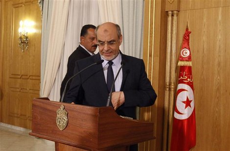Tunisia's Prime Minister Hamadi Jebali arrives to address a news conference in Tunis February 18, 2013. REUTERS/Zoubeir Souissi Tunisia's Prime Minister Hamadi Jebali arrives to address a news conference in Tunis February 18, 2013. REUTERS/Zoubeir Souissi