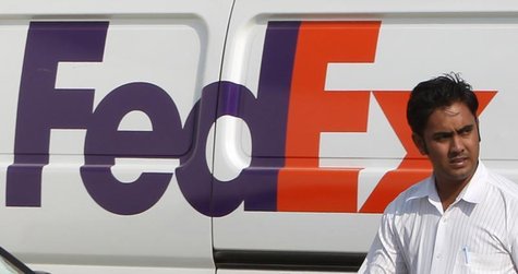 A man walks past a FedEx vehicle at the company's office in Dubai October 30, 2010. REUTERS/Ahmed Jadallah A man walks past a FedEx vehicle at the company's office in Dubai October 30, 2010. REUTERS/Ahmed Jadallah