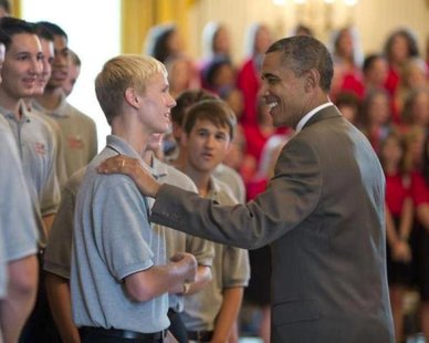 Holland High's Connor Bos (L) has met President Obama (courtesy photo) Holland High's Connor Bos (L) has met President Obama (courtesy photo)