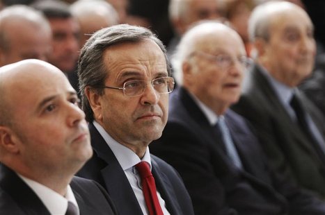 Greece's Prime Minister Antonis Samaras (2nd L) attends the "Initiative Against the Crisis" news conference by Stavros Niarchos foundation a Greece's Prime Minister Antonis Samaras (2nd L) attends the "Initiative Against the Crisis" news conference by Stavros Niarchos foundation a