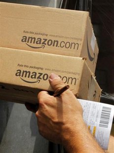 A driver delivers two packages from Amazon.com in Boston, Massachusetts in this July 26, 2011 file photo. REUTERS/Brian Snyder A driver delivers two packages from Amazon.com in Boston, Massachusetts in this July 26, 2011 file photo. REUTERS/Brian Snyder