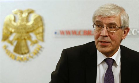 Russia's Central Bank Governor Sergei Ignatyev leaves after a news conference in Moscow in this February 15, 2013 file photo. Nearly $50 bil Russia's Central Bank Governor Sergei Ignatyev leaves after a news conference in Moscow in this February 15, 2013 file photo. Nearly $50 bil