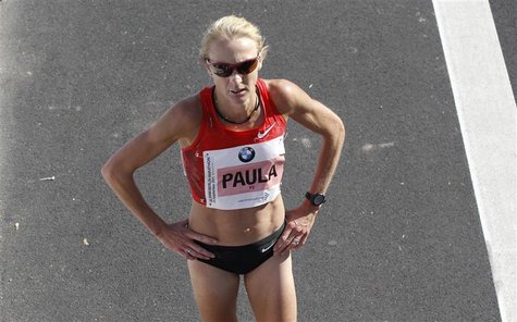 Britain's Paula Radcliff reacts after finishing third in the 38th Berlin Marathon in Berlin, September 25, 2011. REUTERS/Fabrizio Bensch Britain's Paula Radcliff reacts after finishing third in the 38th Berlin Marathon in Berlin, September 25, 2011. REUTERS/Fabrizio Bensch
