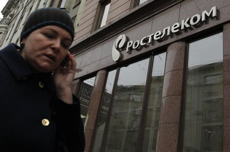 A woman passes by an office of Russian telecoms firm Rostelecom in Moscow, November 21, 2012. REUTERS/Maxim Shemetov A woman passes by an office of Russian telecoms firm Rostelecom in Moscow, November 21, 2012. REUTERS/Maxim Shemetov