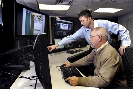 U.S. Department of Homeland Security (DHS) employees work on the Industrial Control Systems Cyber Emergency Response Team (ICS-CERT) operati U.S. Department of Homeland Security (DHS) employees work on the Industrial Control Systems Cyber Emergency Response Team (ICS-CERT) operati