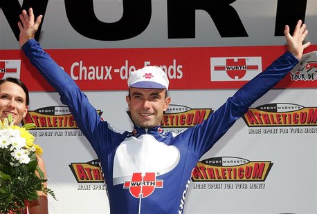 Spain's Angel Vicioso celebrates on the podium after winning the fourth stage of the Tour de Suisse cycling race from Niederbipp to La Chaux Spain's Angel Vicioso celebrates on the podium after winning the fourth stage of the Tour de Suisse cycling race from Niederbipp to La Chaux