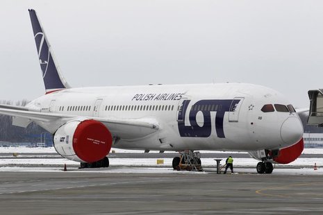 A Dreamliner belonging to Polish airline LOT is being parked on the tarmac at Chopin International Airport in Warsaw February 13, 2013. REUT A Dreamliner belonging to Polish airline LOT is being parked on the tarmac at Chopin International Airport in Warsaw February 13, 2013. REUT