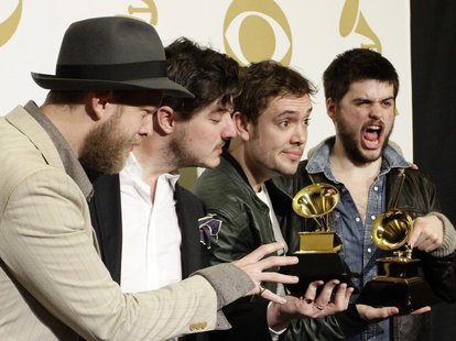 Mumford & Sons pose with their awards for Album of the Year for "Babel" and Best Long Form Music Video for "Big Easy Express" backstage at t Mumford & Sons pose with their awards for Album of the Year for "Babel" and Best Long Form Music Video for "Big Easy Express" backstage at t