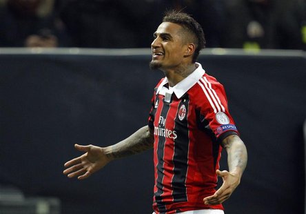 AC Milan's Kevin-Prince Boateng reacts after scoring against Barcelona during their Champions League soccer match at the San Siro stadium in AC Milan's Kevin-Prince Boateng reacts after scoring against Barcelona during their Champions League soccer match at the San Siro stadium in