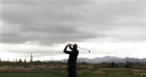 Ian Poulter of England hits off the third tee during the first round of the WGC-Accenture Match Play Championship golf tournament in Marana, Ian Poulter of England hits off the third tee during the first round of the WGC-Accenture Match Play Championship golf tournament in Marana,