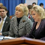 from left to right, Sean McCann, Tonya Schuitmaker and Margaret O'Brien testifying before the State Senate Transportation Committee to rename section of I-94