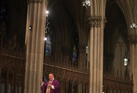 Cardinal Timothy Dolan, the Archbishop of New York, leads mass at Saint Patrick's Cathedral on Ash Wednesday in New York February 13, 2013. Cardinal Timothy Dolan, the Archbishop of New York, leads mass at Saint Patrick's Cathedral on Ash Wednesday in New York February 13, 2013.