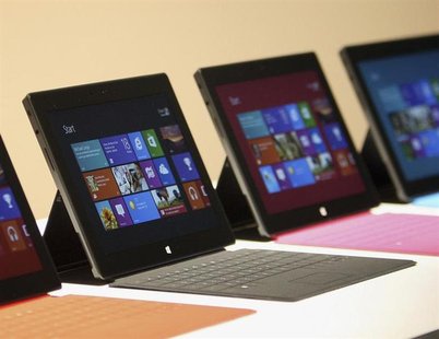 New Surface tablet computers with keyboards are displayed at its unveiling by Microsoft in Los Angeles, California, June 18, 2012. REUTERS/D New Surface tablet computers with keyboards are displayed at its unveiling by Microsoft in Los Angeles, California, June 18, 2012. REUTERS/D
