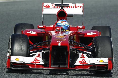 Ferrari's Formula One driver Fernando Alonso of Spain takes a curve during a training session at Circuit de Catalunya racetrack in Montmelo, Ferrari's Formula One driver Fernando Alonso of Spain takes a curve during a training session at Circuit de Catalunya racetrack in Montmelo,