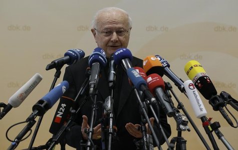 Archbishop Robert Zollitsch, head of Germany's bishop's conference gives a media statement before the German bishop's annual meeting in Trie Archbishop Robert Zollitsch, head of Germany's bishop's conference gives a media statement before the German bishop's annual meeting in Trie