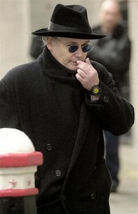 Stuart Goddard, formerly known as pop star Adam Ant, arrives at the Old Bailey in London, October 2, 2002. STR New Stuart Goddard, formerly known as pop star Adam Ant, arrives at the Old Bailey in London, October 2, 2002. STR New