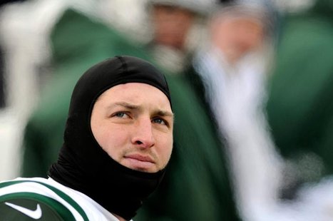 New York Jets quarterback Tim Tebow is on the bench against the Buffalo Bills in the third quarter of their NFL football game in Orchard Par New York Jets quarterback Tim Tebow is on the bench against the Buffalo Bills in the third quarter of their NFL football game in Orchard Par