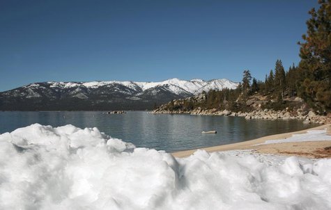 Snow is piled on a Lake Tahoe beach in Sand Harbor, Nevada February 3, 2012. REUTERS/Robert Galbraith Snow is piled on a Lake Tahoe beach in Sand Harbor, Nevada February 3, 2012. REUTERS/Robert Galbraith