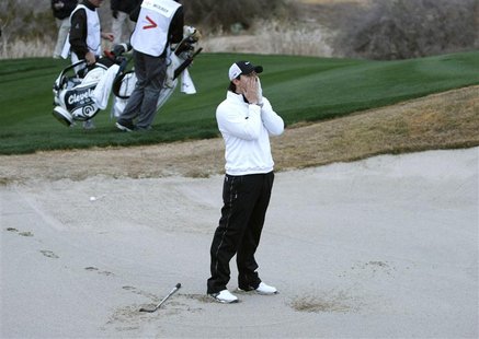 Northern Ireland's Rory McIlroy reacts after hitting out of the sand on the 18th in loss to Shane Lowry of Ireland during the weather delaye Northern Ireland's Rory McIlroy reacts after hitting out of the sand on the 18th in loss to Shane Lowry of Ireland during the weather delaye