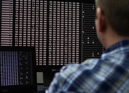 An analyst looks at code in the malware lab of a cyber security defense lab at the Idaho National Laboratory in Idaho Falls, Idaho September An analyst looks at code in the malware lab of a cyber security defense lab at the Idaho National Laboratory in Idaho Falls, Idaho September