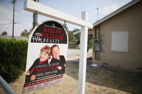 A real estate sign is seen outside a deserted home stripped of its copper wiring in San Bernardino, California September 11, 2012. REUTERS/L A real estate sign is seen outside a deserted home stripped of its copper wiring in San Bernardino, California September 11, 2012. REUTERS/L