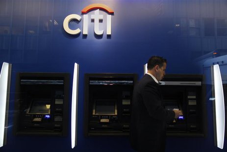 A man walks past a Citibank branch in lower Manhattan, New York October 16, 2012. REUTERS/Carlo Allegri (UNITED STATES - Tags: BUSINESS) - R A man walks past a Citibank branch in lower Manhattan, New York October 16, 2012. REUTERS/Carlo Allegri (UNITED STATES - Tags: BUSINESS) - R