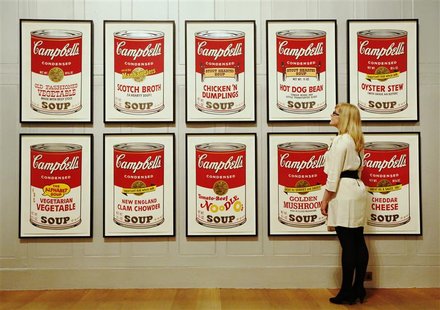 Gallery employee Maddy Adeane poses with Andy Warhol's "Campbell's Soup II" (1969) at the Dulwich Picture Gallery in London June 19, 2012. R Gallery employee Maddy Adeane poses with Andy Warhol's "Campbell's Soup II" (1969) at the Dulwich Picture Gallery in London June 19, 2012. R