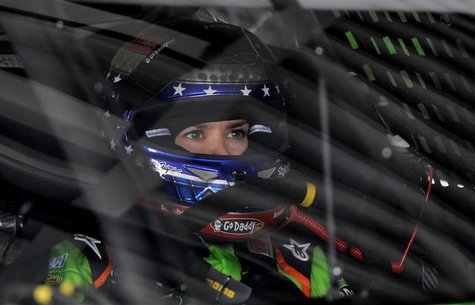 Danica Patrick adjusts her gear before leaving her garage in her number 10 Chevrolet during NASCAR Sprint Cup Series practice at the Daytona Danica Patrick adjusts her gear before leaving her garage in her number 10 Chevrolet during NASCAR Sprint Cup Series practice at the Daytona
