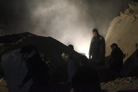 People search for survivors under rubble after what activists said was a Scud missile hit in Aleppo's Tariq al-Bab neighbourhood February 22 People search for survivors under rubble after what activists said was a Scud missile hit in Aleppo's Tariq al-Bab neighbourhood February 22