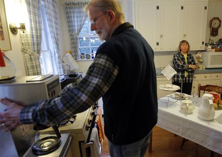 Ada May Roberts (R) and her husband Donald prepare breakfast for the guests at their Amelia Payson House Bed and Breakfast in Salem, Massach Ada May Roberts (R) and her husband Donald prepare breakfast for the guests at their Amelia Payson House Bed and Breakfast in Salem, Massach