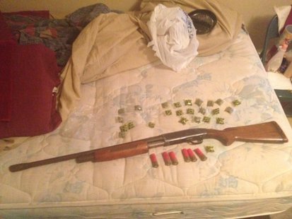 Drugs and firearms were found at the residence. Drugs and firearms were found at the residence.