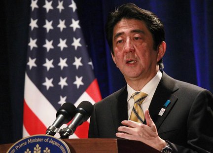 Japan's Prime Minister Shinzo Abe participates in a media conference at a Washington hotel, February 22, 2013. REUTERS/Jason Reed (UNITED ST Japan's Prime Minister Shinzo Abe participates in a media conference at a Washington hotel, February 22, 2013. REUTERS/Jason Reed (UNITED ST