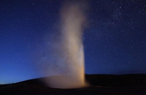 A night exposure of Old Faithful Geyser, the first geyser in the park to be named, erupting in Yellowstone National Park, Wyoming, June 23, A night exposure of Old Faithful Geyser, the first geyser in the park to be named, erupting in Yellowstone National Park, Wyoming, June 23,