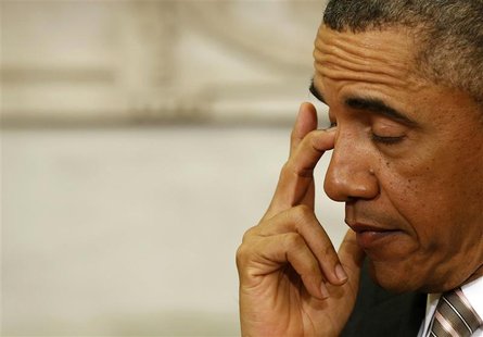 U.S. President Barack Obama listens to Japanese Prime Minister Shinzo Abe speak in the Oval Office at the White House in Washington, Februar U.S. President Barack Obama listens to Japanese Prime Minister Shinzo Abe speak in the Oval Office at the White House in Washington, Februar