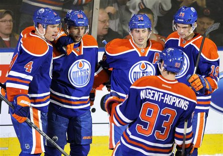 Edmonton Oilers' (L-R) Taylor Hall, Sam Gagner, Jordan Eberle, Ryan Nugent-Hopkins and Justin Schultz celebrate a goal against the Los Angel Edmonton Oilers' (L-R) Taylor Hall, Sam Gagner, Jordan Eberle, Ryan Nugent-Hopkins and Justin Schultz celebrate a goal against the Los Angel