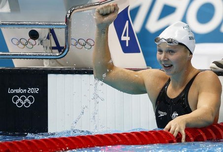 Australia's Melanie Schlanger celebrates after she won her women's 100m freestyle semi-final during the London 2012 Olympic Games at the Aqu Australia's Melanie Schlanger celebrates after she won her women's 100m freestyle semi-final during the London 2012 Olympic Games at the Aqu