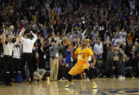 Golden State Warriors Jarrett Jack celebrates after making a three-point basket against the San Antonio Spurs late in regulation play during Golden State Warriors Jarrett Jack celebrates after making a three-point basket against the San Antonio Spurs late in regulation play during