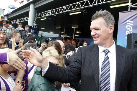 John Kirwan greets well-wishers as Japan arrives at Auckland International airport for the Rugby World Cup August 31, 2011. REUTERS/Nigel Ma John Kirwan greets well-wishers as Japan arrives at Auckland International airport for the Rugby World Cup August 31, 2011. REUTERS/Nigel Ma