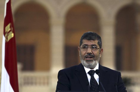 Egyptian President Mohamed Mursi speaks during a news conference with Turkish President Abdullah Gul (not pictured) after their meeting at P Egyptian President Mohamed Mursi speaks during a news conference with Turkish President Abdullah Gul (not pictured) after their meeting at P