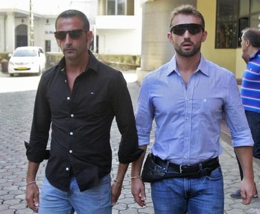 Italian sailors Salvatore Girone (R) and Massimiliano Latorre leave the police commissioner office in the southern Indian city of Kochi Janu Italian sailors Salvatore Girone (R) and Massimiliano Latorre leave the police commissioner office in the southern Indian city of Kochi Janu