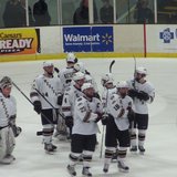 The Broncos celebrate after their 4-3 shootout victory over the Fighting Irish
