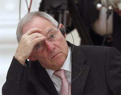 German Finance Minister Wolfgang Schaeuble reacts during a meeting of G20 representatives with Russian President Vladimir Putin in the Kreml German Finance Minister Wolfgang Schaeuble reacts during a meeting of G20 representatives with Russian President Vladimir Putin in the Kreml