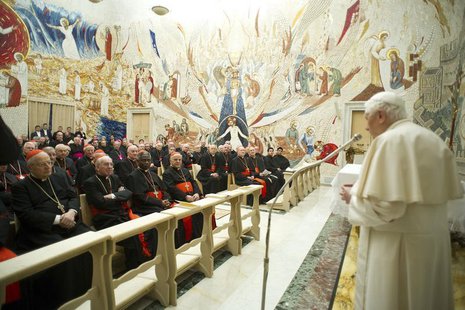 Pope Benedict XVI (R) speaks to Cardinals during the closing day of the Spiritual Exercises at the Vatican February 23, 2013. REUTERS/Osserv Pope Benedict XVI (R) speaks to Cardinals during the closing day of the Spiritual Exercises at the Vatican February 23, 2013. REUTERS/Osserv