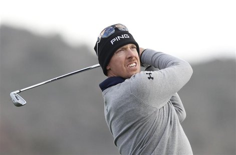 Hunter Mahan of the U.S. watches his tee shot on the third hole during the semifinal round of the WGC-Accenture Match Play Championship golf Hunter Mahan of the U.S. watches his tee shot on the third hole during the semifinal round of the WGC-Accenture Match Play Championship golf