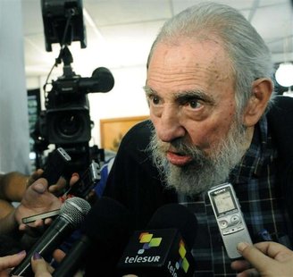 Former Cuban leader Fidel Castro speaks to reporters at a polling station in Havana February 3, 2013. REUTERS/AIN FOTO/Marcelino Vazquez Former Cuban leader Fidel Castro speaks to reporters at a polling station in Havana February 3, 2013. REUTERS/AIN FOTO/Marcelino Vazquez