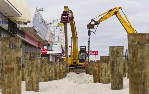A construction crew puts pilings into the sand as the reconstruction of the boardwalk continues in Seaside Heights, New Jersey, February 22, A construction crew puts pilings into the sand as the reconstruction of the boardwalk continues in Seaside Heights, New Jersey, February 22,