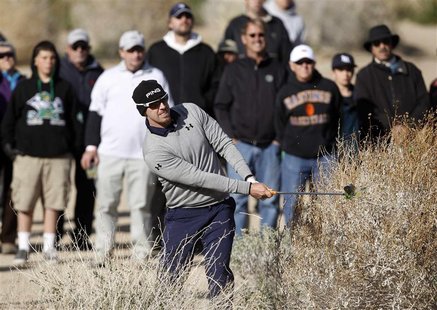 Hunter Mahan of the U.S. hits out of the bushes on the 17th hole during the championship match of the WGC-Accenture Match Play Championship Hunter Mahan of the U.S. hits out of the bushes on the 17th hole during the championship match of the WGC-Accenture Match Play Championship